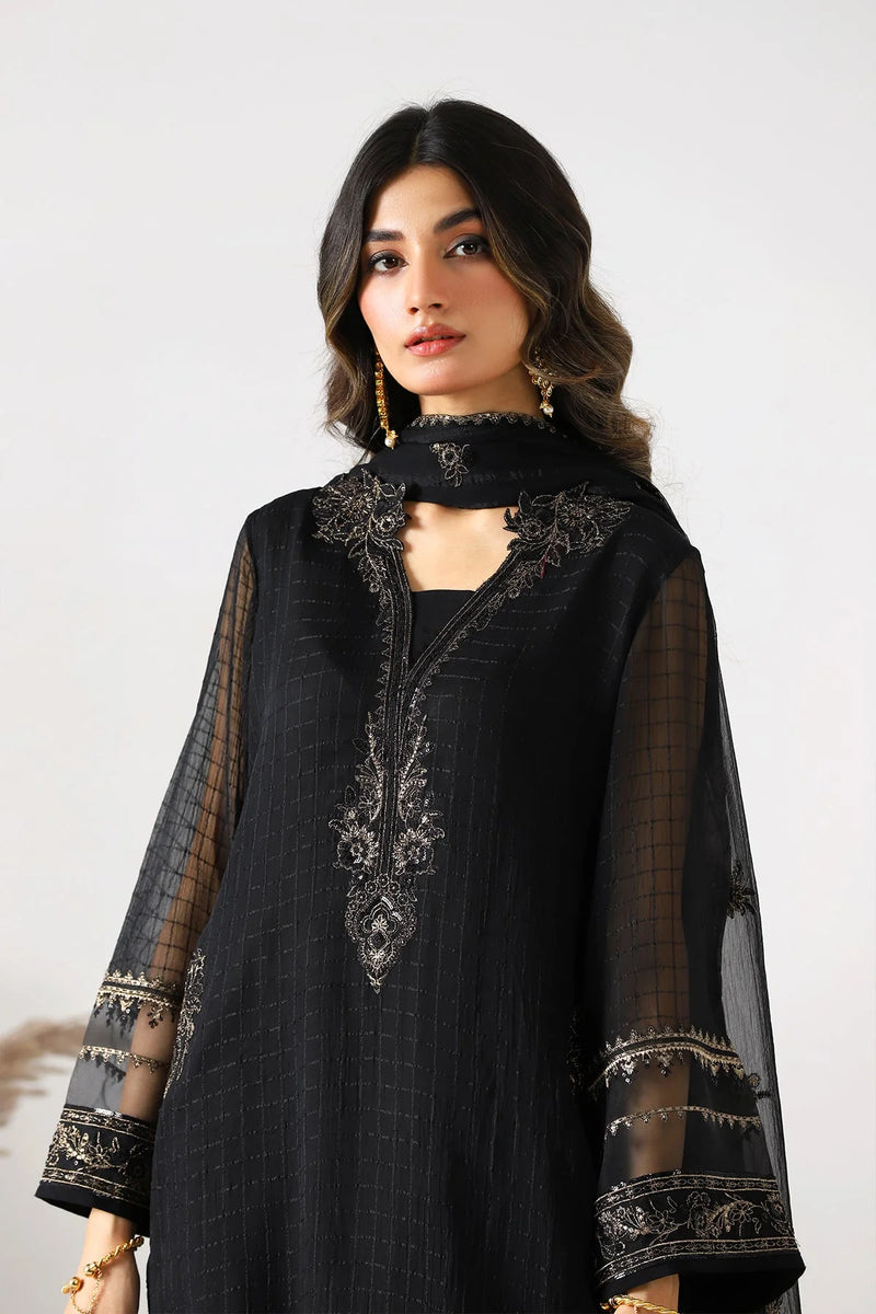 Buy this luxurious black chiffon suit from Charizma – a stunning addition to Punjabi suits in Canada.