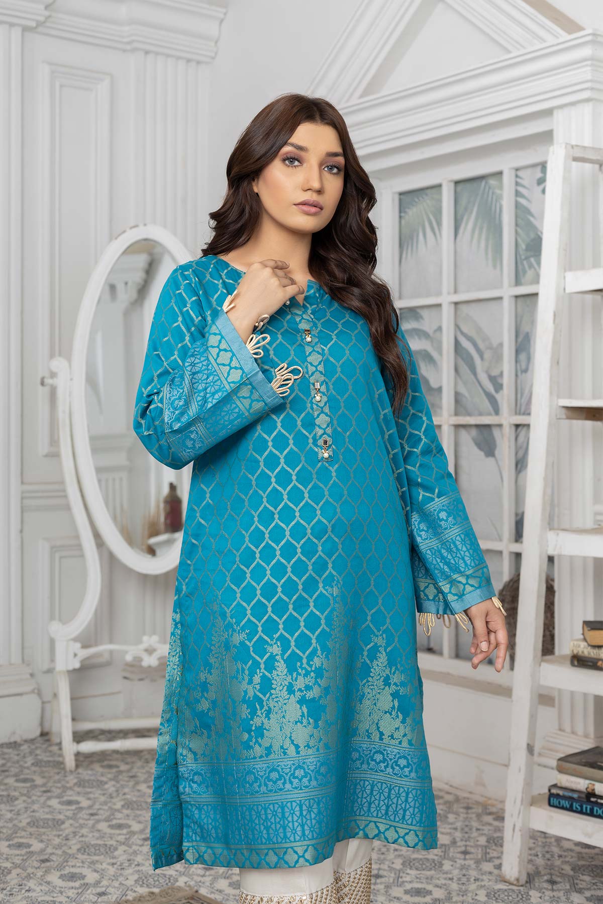 FRONT VIEW OF Pakistani suits in Canada with this stylish teal green jacquard lawn shirt from Charisma, adorned with fancy buttons.