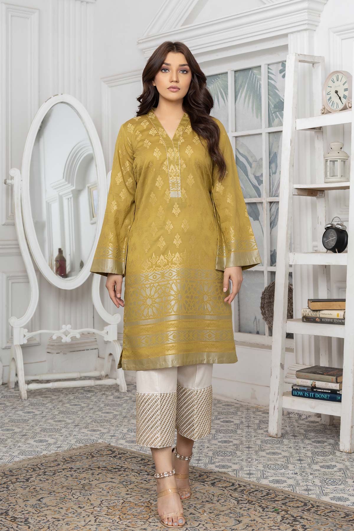 lady wearing Charisma olive green jacquard lawn shirt – a refined choice for Pakistani suits online in Canada, featuring intricate lace details.