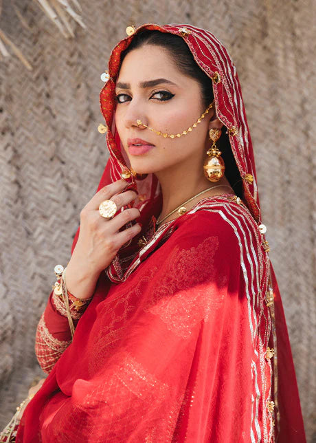 Model wearing Hussain Rehar maroon chiffon dupatta with traditional Pakistani jewelry and styling