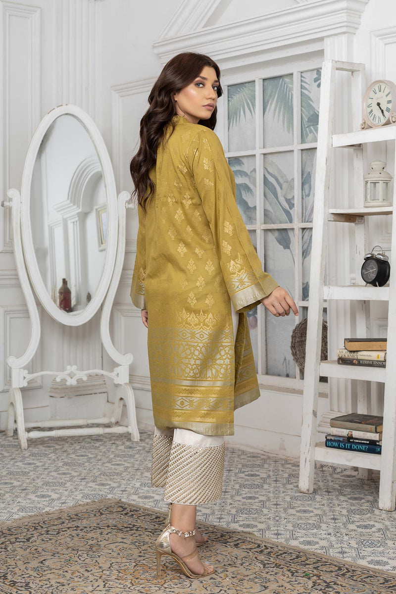 lady showing back view of Charisma’s olive green jacquard lawn shirt with back lace details – a perfect addition to your Pakistani wardrobe in Canada.