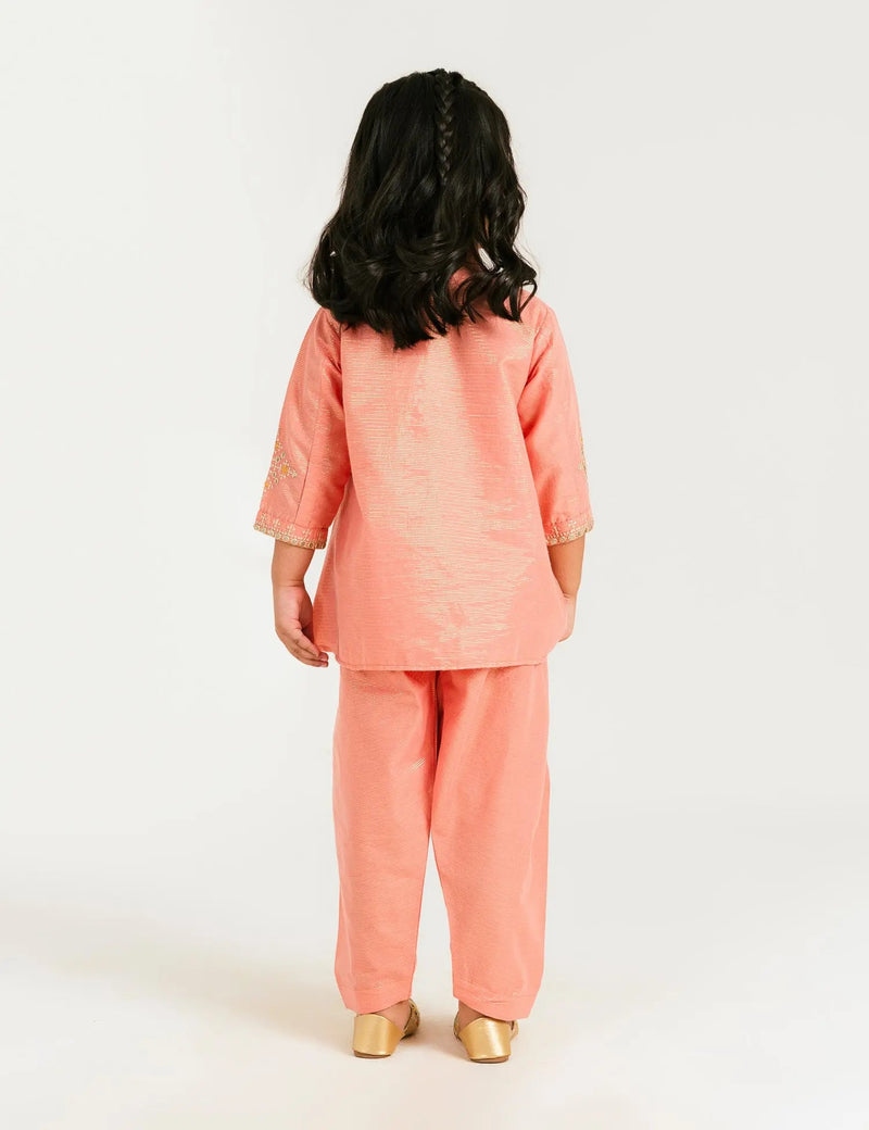 Back view of Beechtree’s peach embroidered kurta, a beautiful Pakistani suit for kids, ideal for semi-formal occasions.