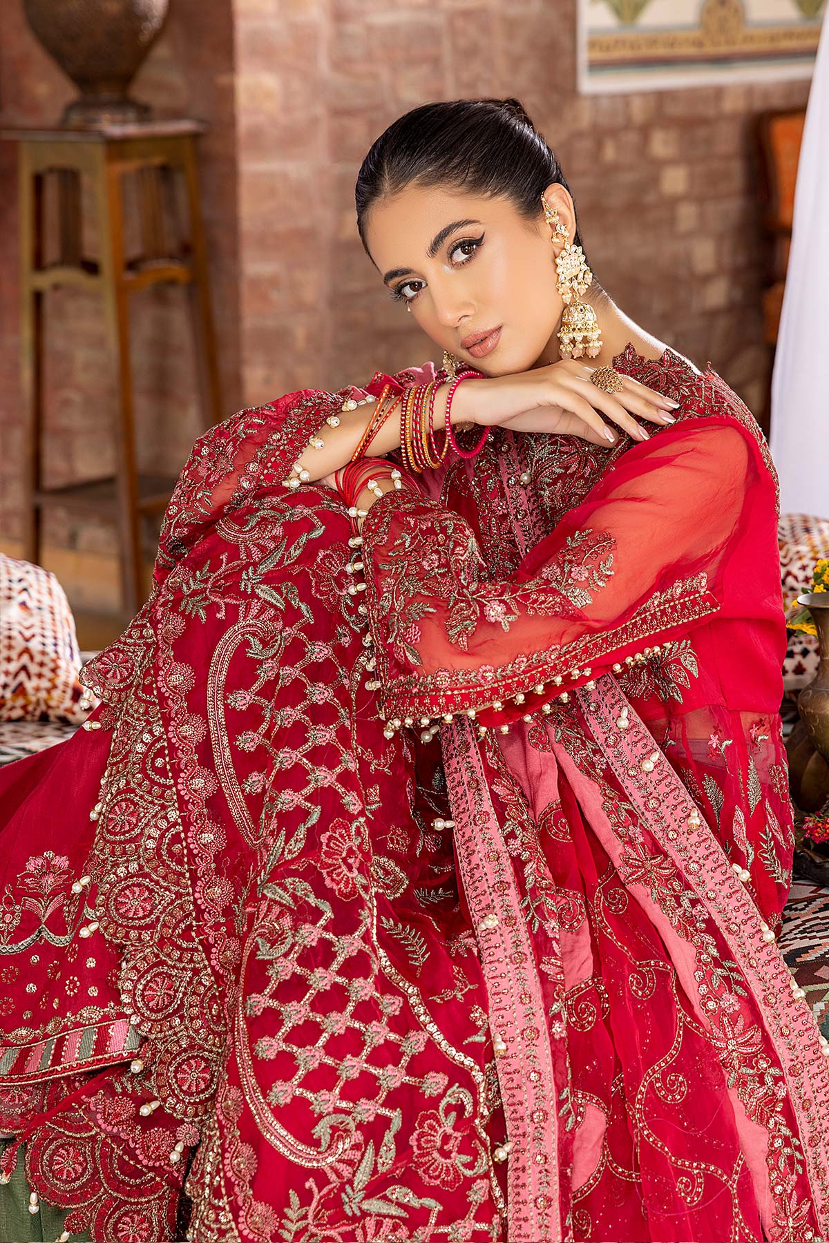 Shop Pakistani suits in Canada with this elegant Charizma organza maxi, detailed with intricate adda hangings.