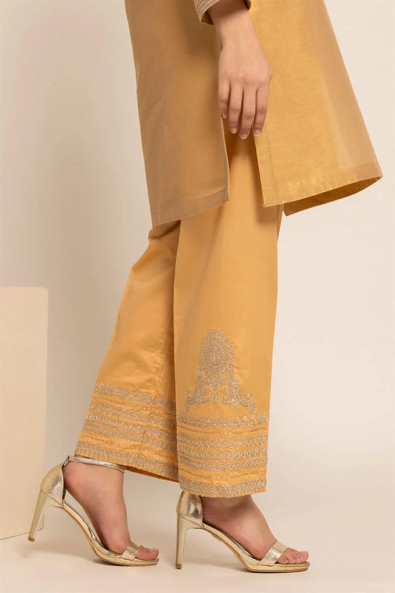 Khaadi Jasper Orange embroidered trousers – a stylish addition to traditional Pakistani clothes in Canada, crafted from premium blended fabric.