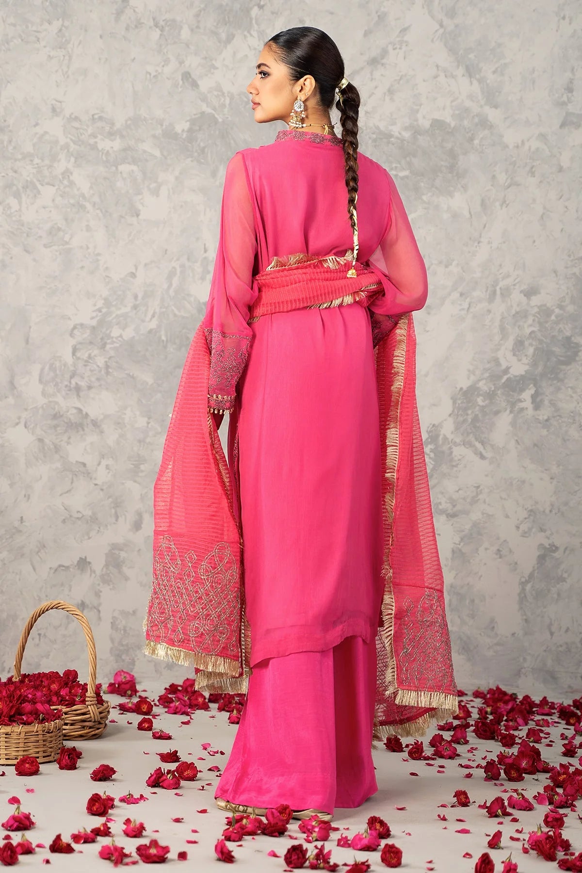 Back view of the Charizma pink embroidered 3PC poly net suit – a sophisticated addition to Pakistani suits online in Canada.