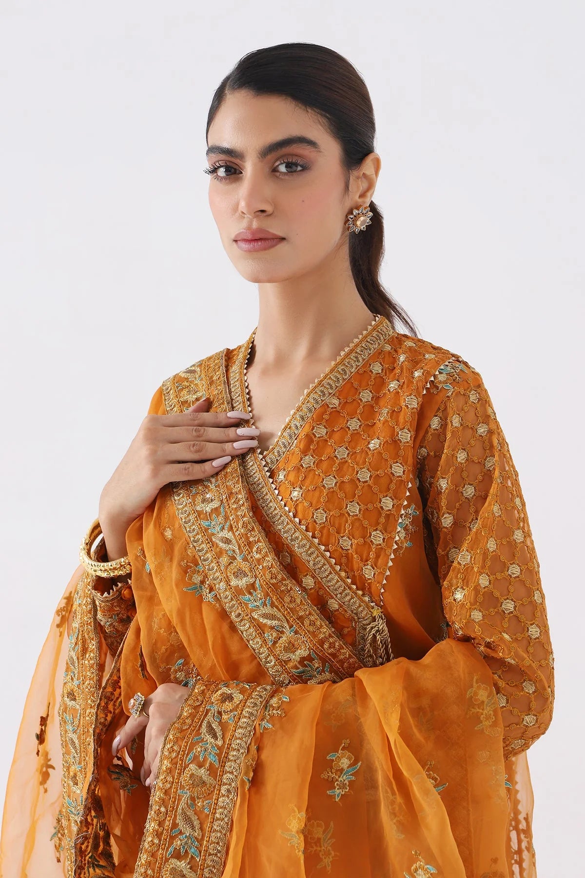 Charizma orange embroidered organza suit – a stunning choice for Pakistani suits online in Canada, featuring intricate tilla embroidery.