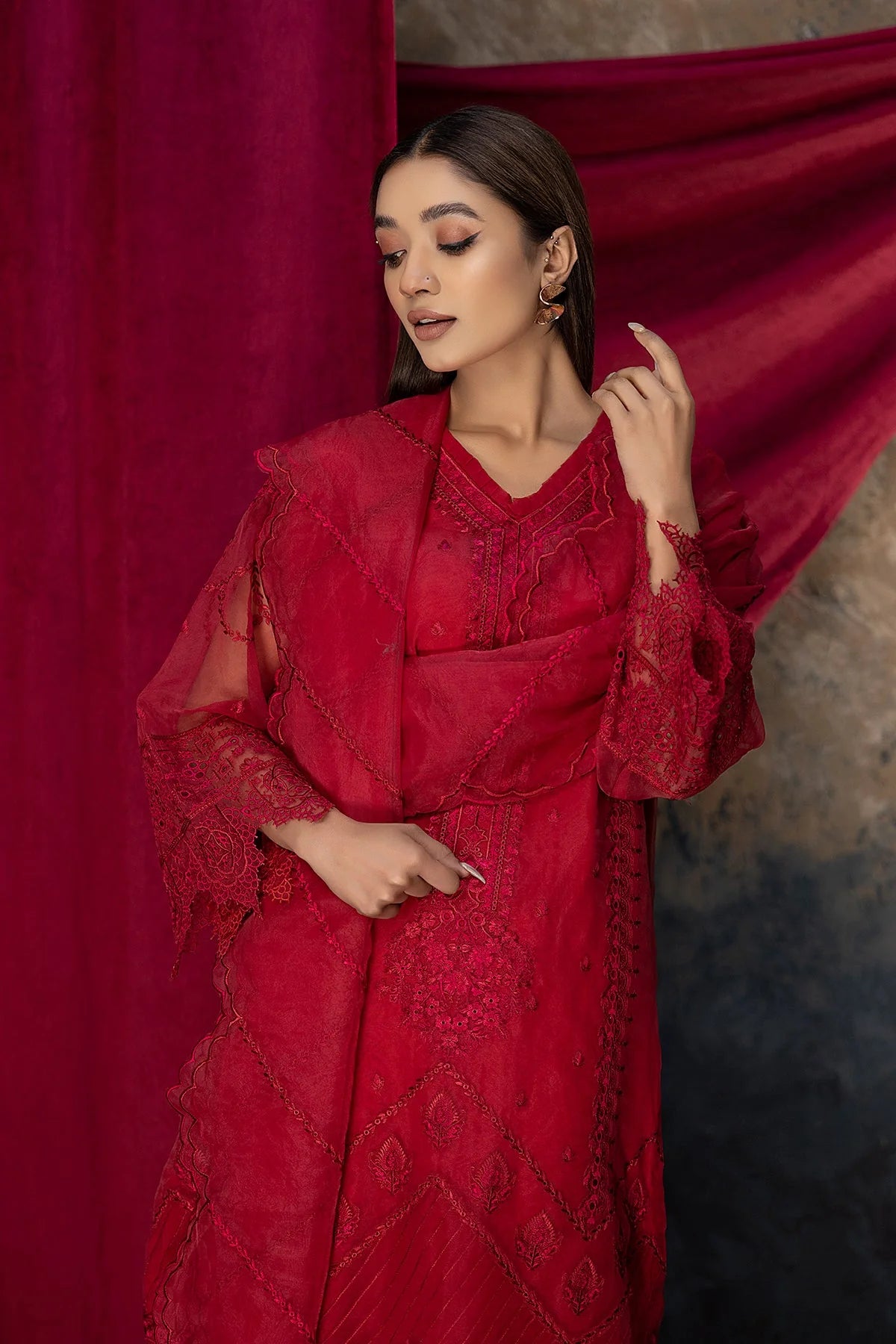 Red organza suit from Charizma with intricate embroidery, a luxurious choice for Punjabi suits in Canada.