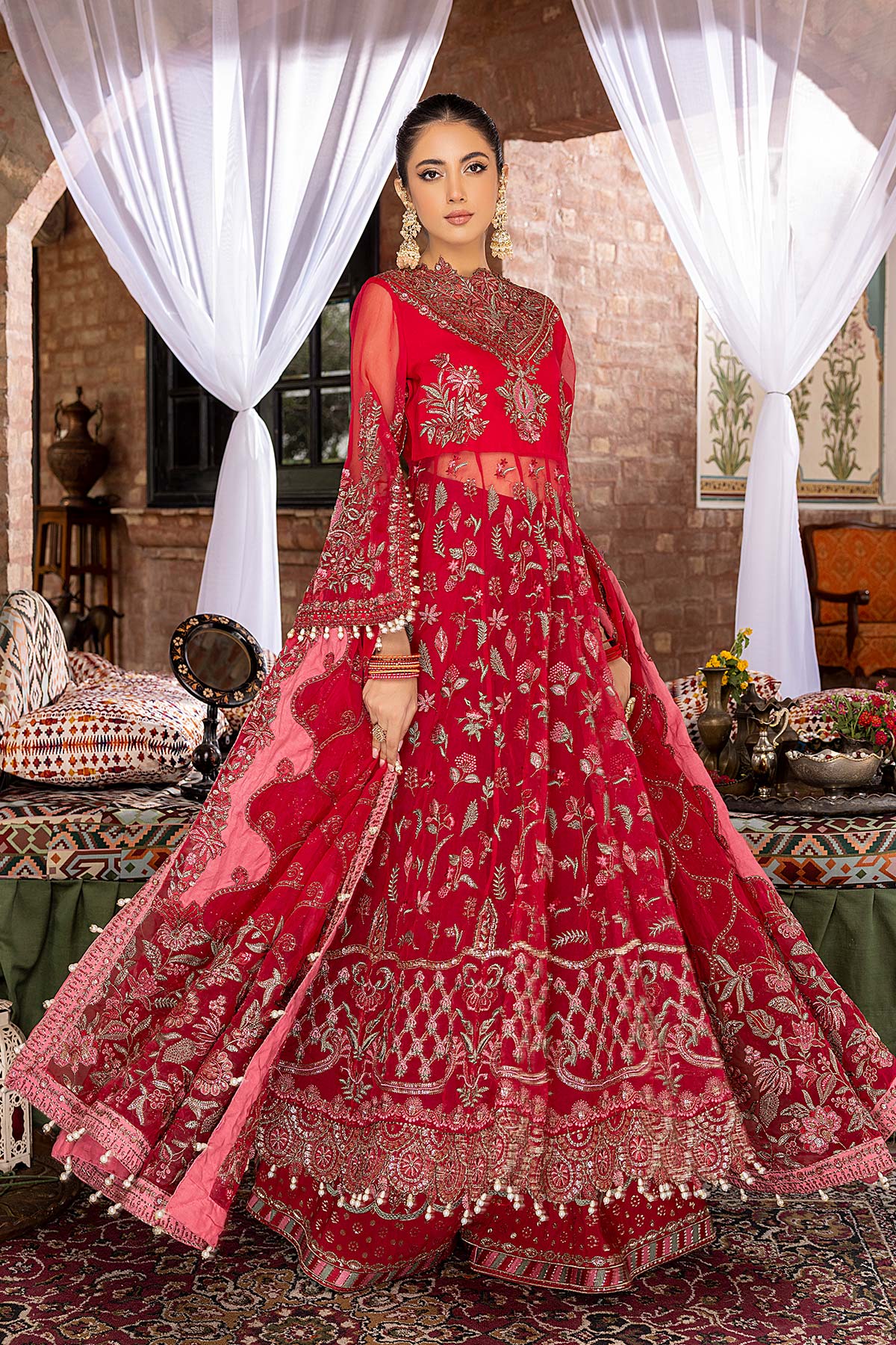 side view of a women wearing Charizma embroidered maxi in premium organza – an ideal pick for formal Pakistani suits in Canada.