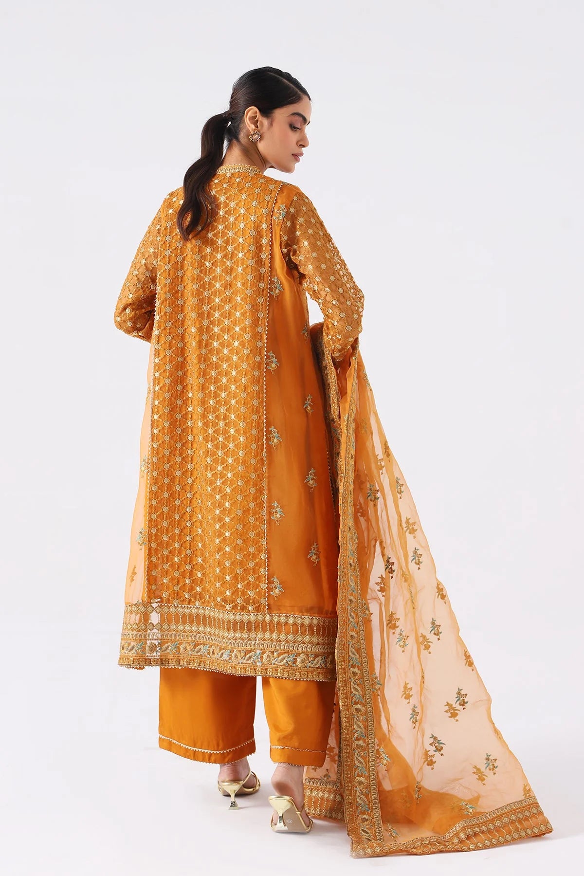 Backside details of Charizma’s embroidered organza suit, an exclusive luxury outfit in the Pakistani suits category.