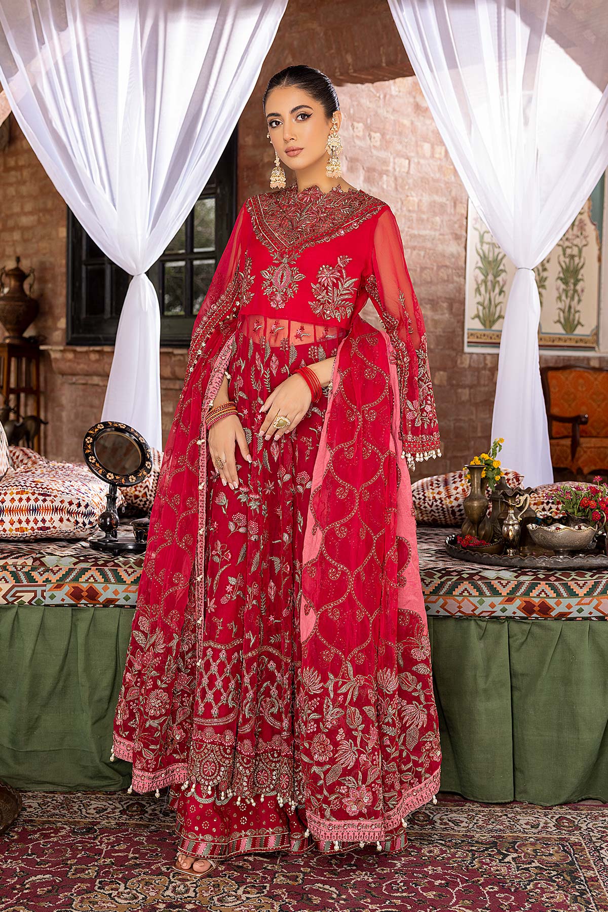 side view of a women wearing Pakistani suits in Canada with this elegant Charizma organza maxi, detailed with intricate adda hangings.