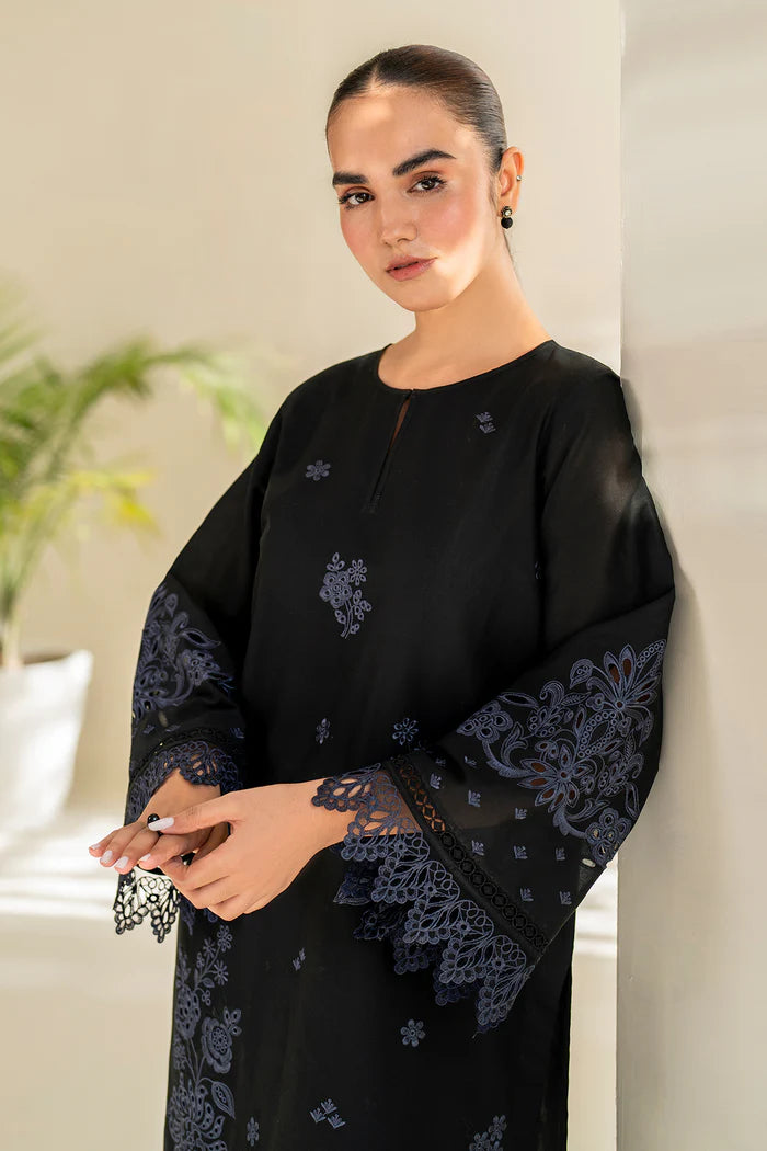 women wearing Baroque black embroidered lawn 2-piece suit – a sophisticated choice for Pakistani suits online in Canada, crafted with premium cotton fabric.