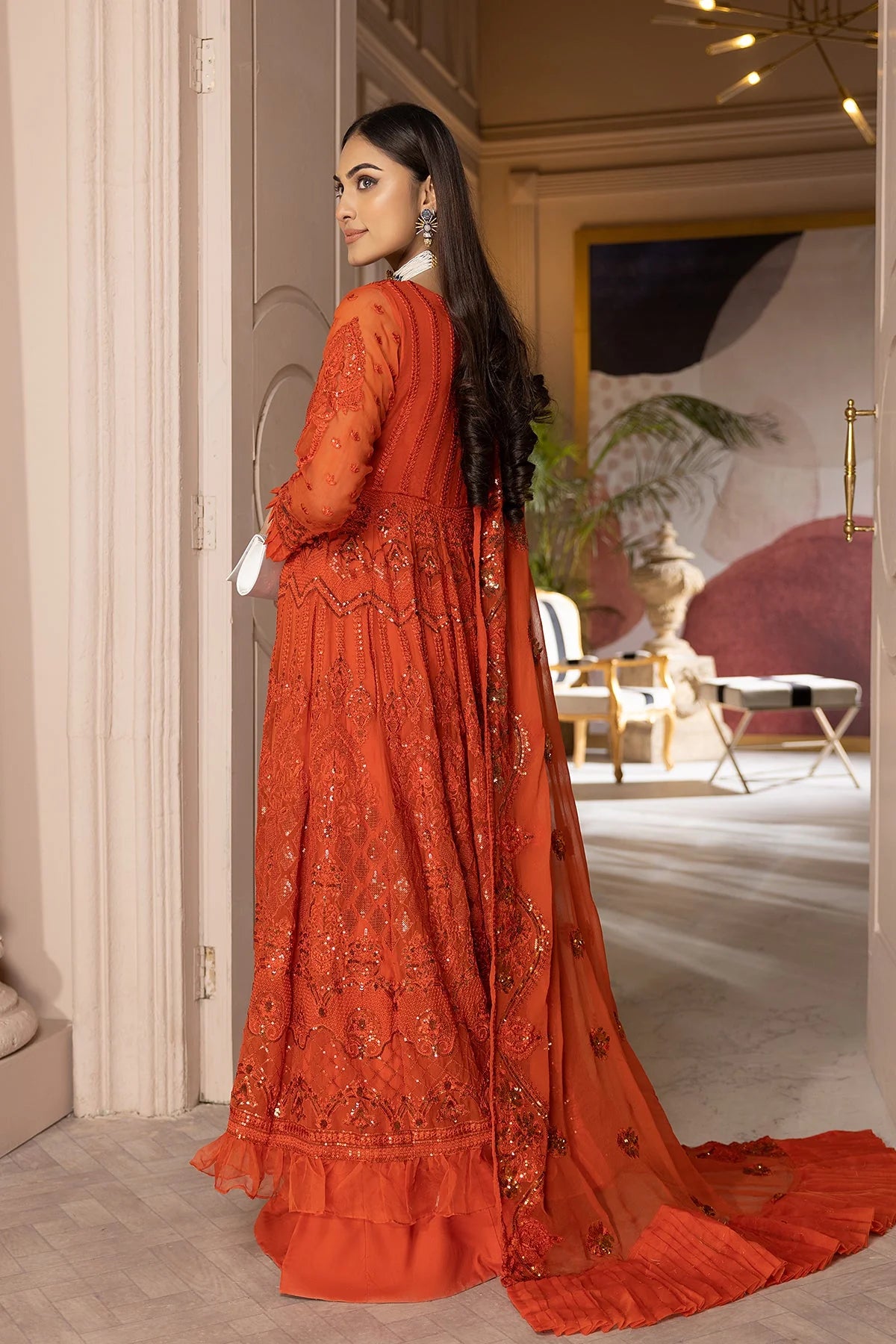 The elegant back design of this Charizma embroidered chiffon and silk sharara suit makes it a must-have for Pakistani suits lovers in Canada.