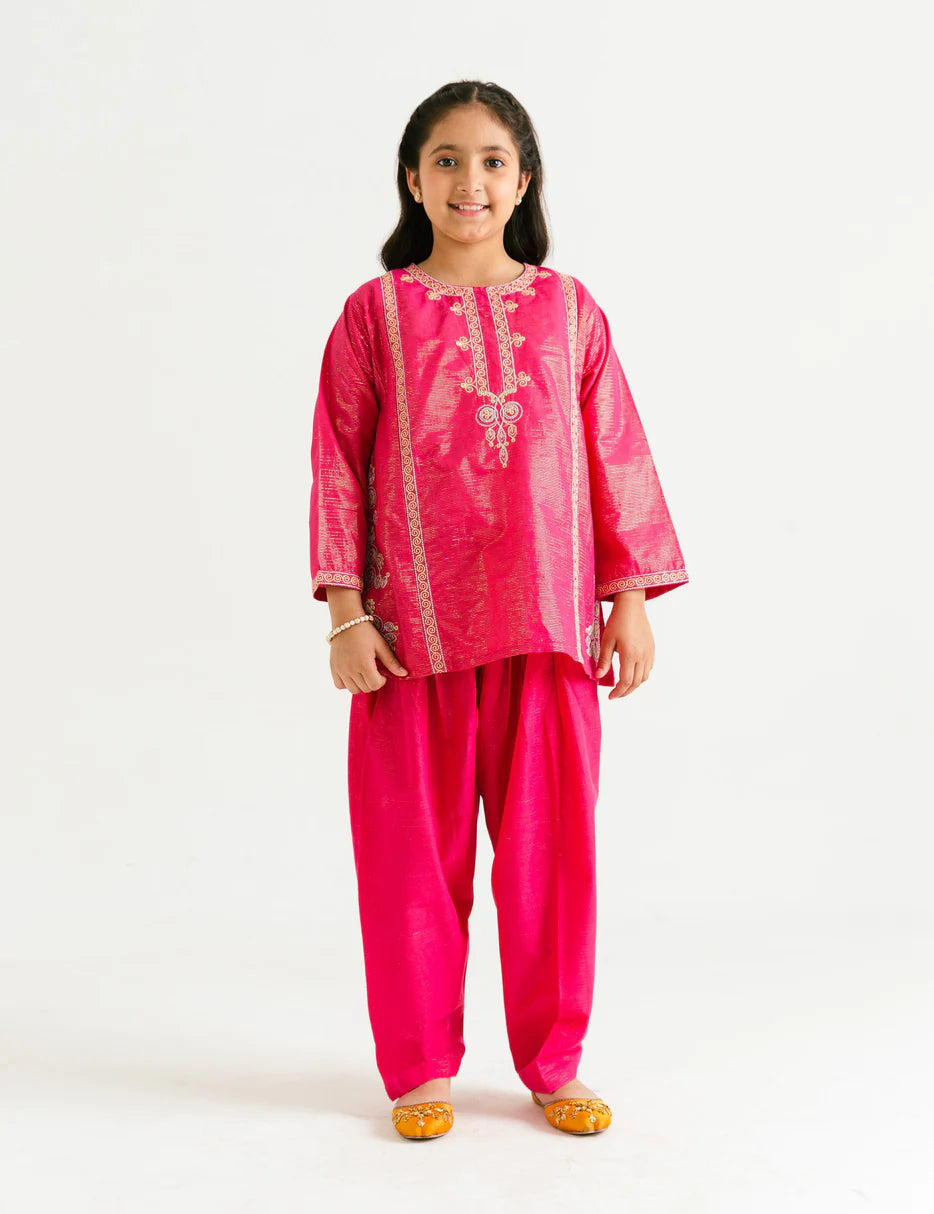 A 11-12-year-old girl wearing a dark pink Beechtree embroidered 2 PC suit – a premium choice for Pakistani suits online in Canada.