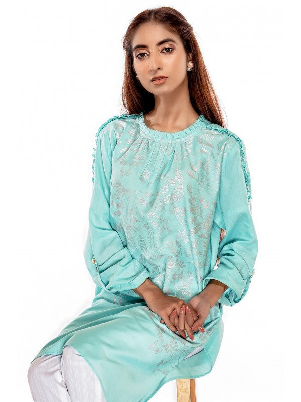  A woman wearing Ego’s elegant sky blue cotton kurta – a refined choice for Pakistani suits online in Canada.