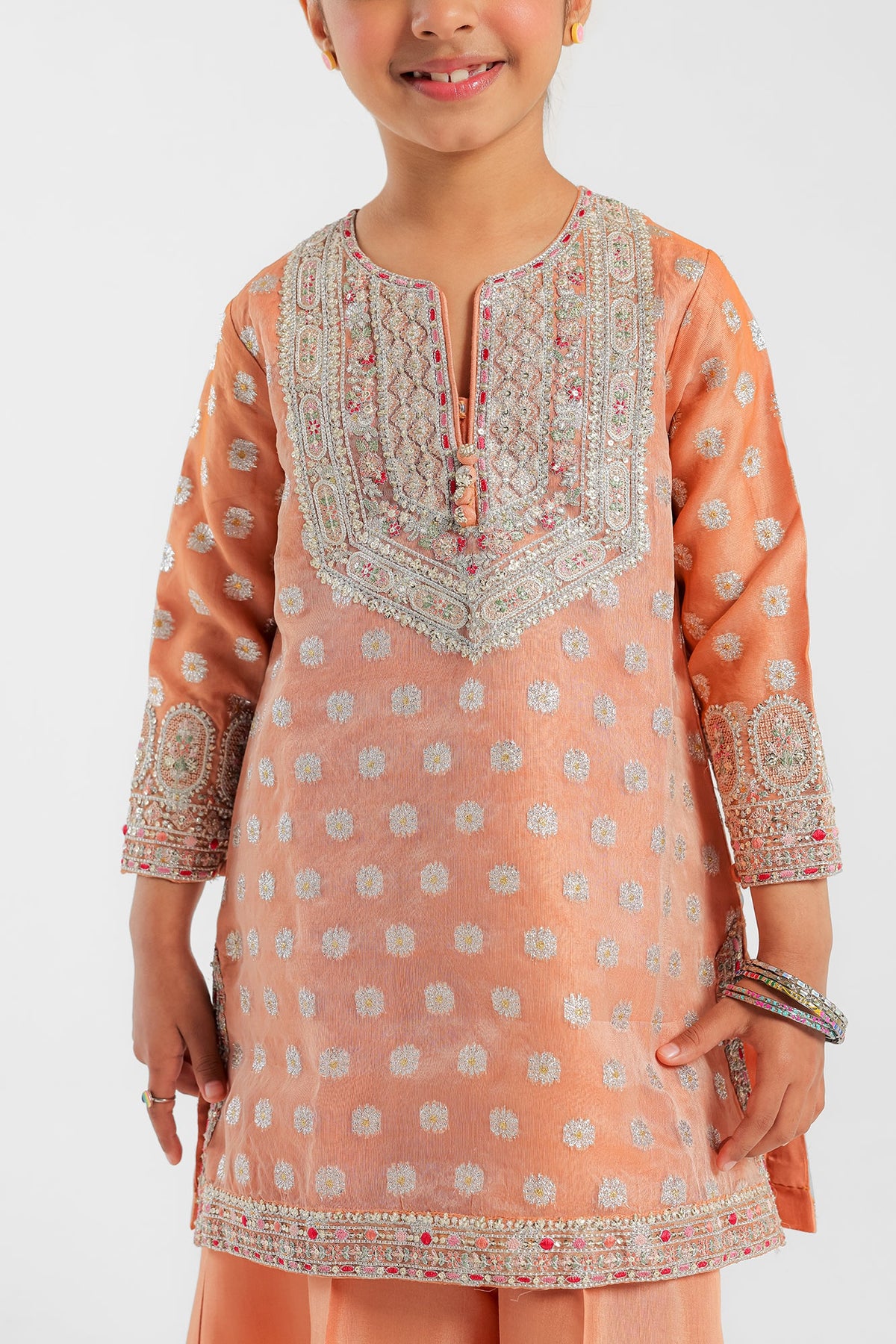 close view of Ethnic’s embroidered 2PC suit, crafted from fancy jacquard fabric – a stunning option for Pakistani suits Canada for kids.