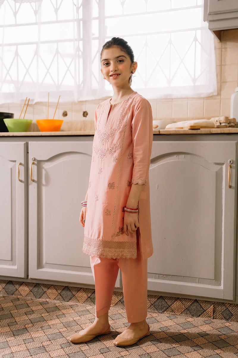 Side profile of Ethnic’s powder pink embroidered suit, showcasing intricate floral embroidery – a stylish pick for Pakistani suits for kids.