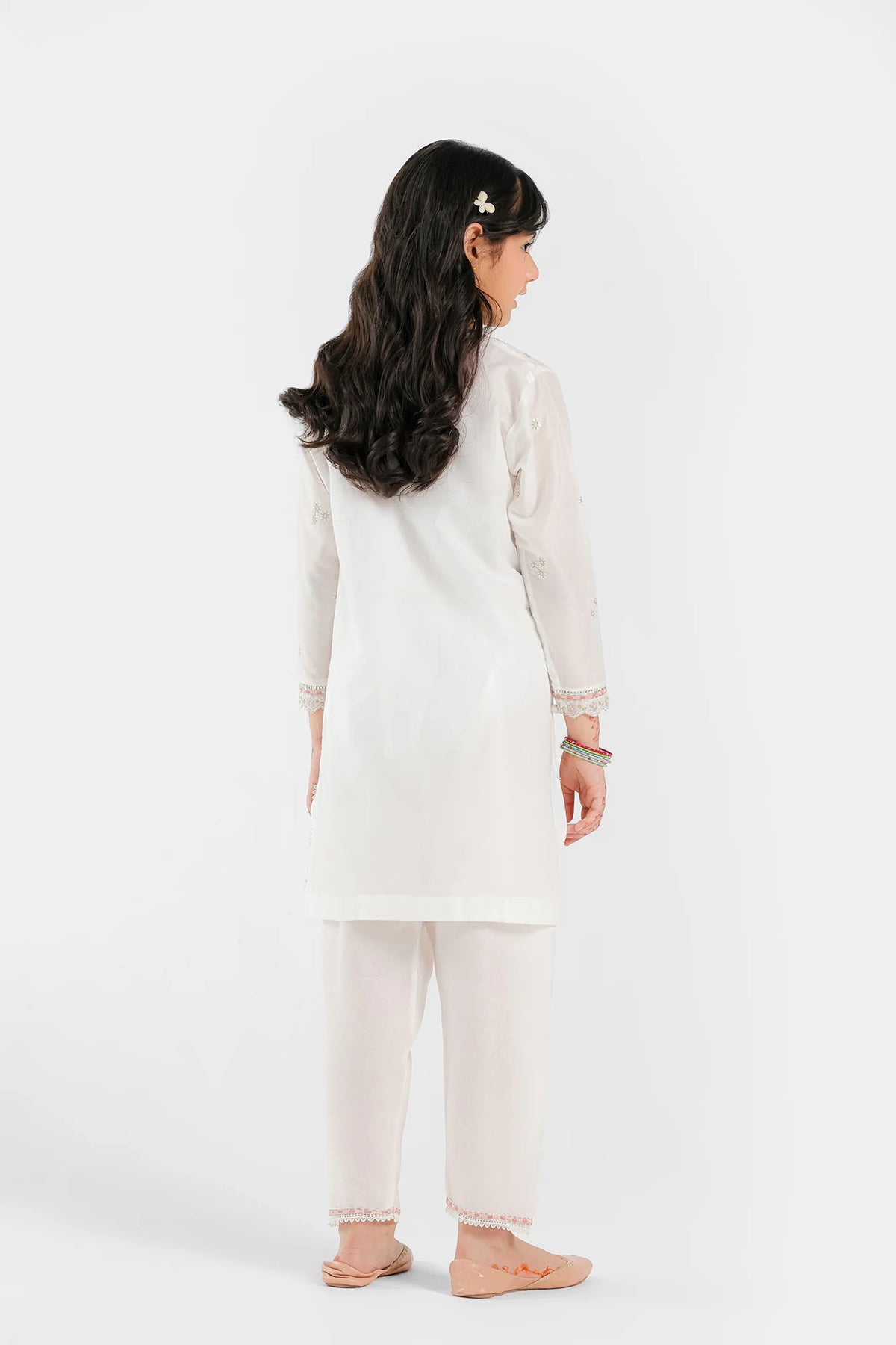 Back View to Discover Pakistani suits in Canada for kids with Ethnic’s embroidered white lawn suit, perfect for traditional occasions.