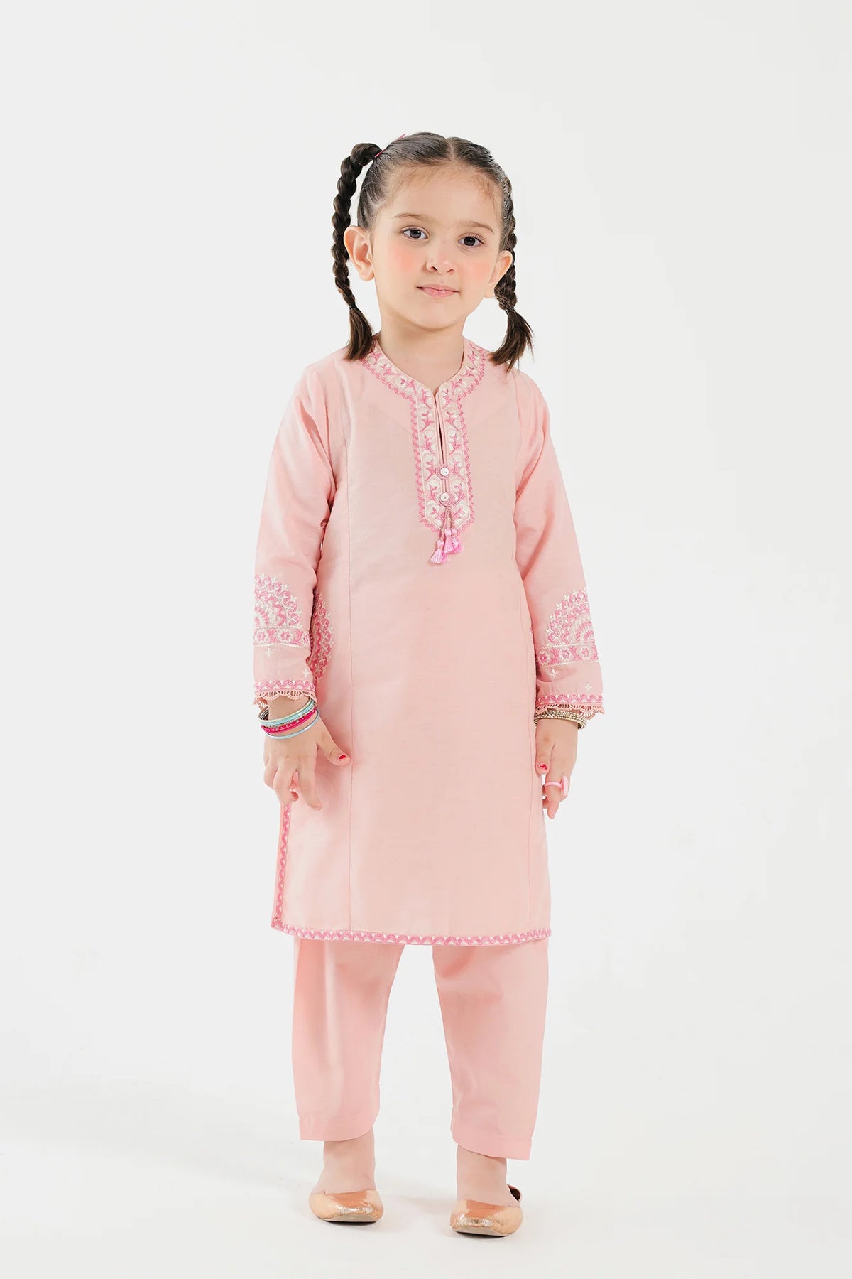 Ethnic powder pink embroidered jacquard suit – a premium choice for Pakistani suits online in Canada, perfect for formal wear.
