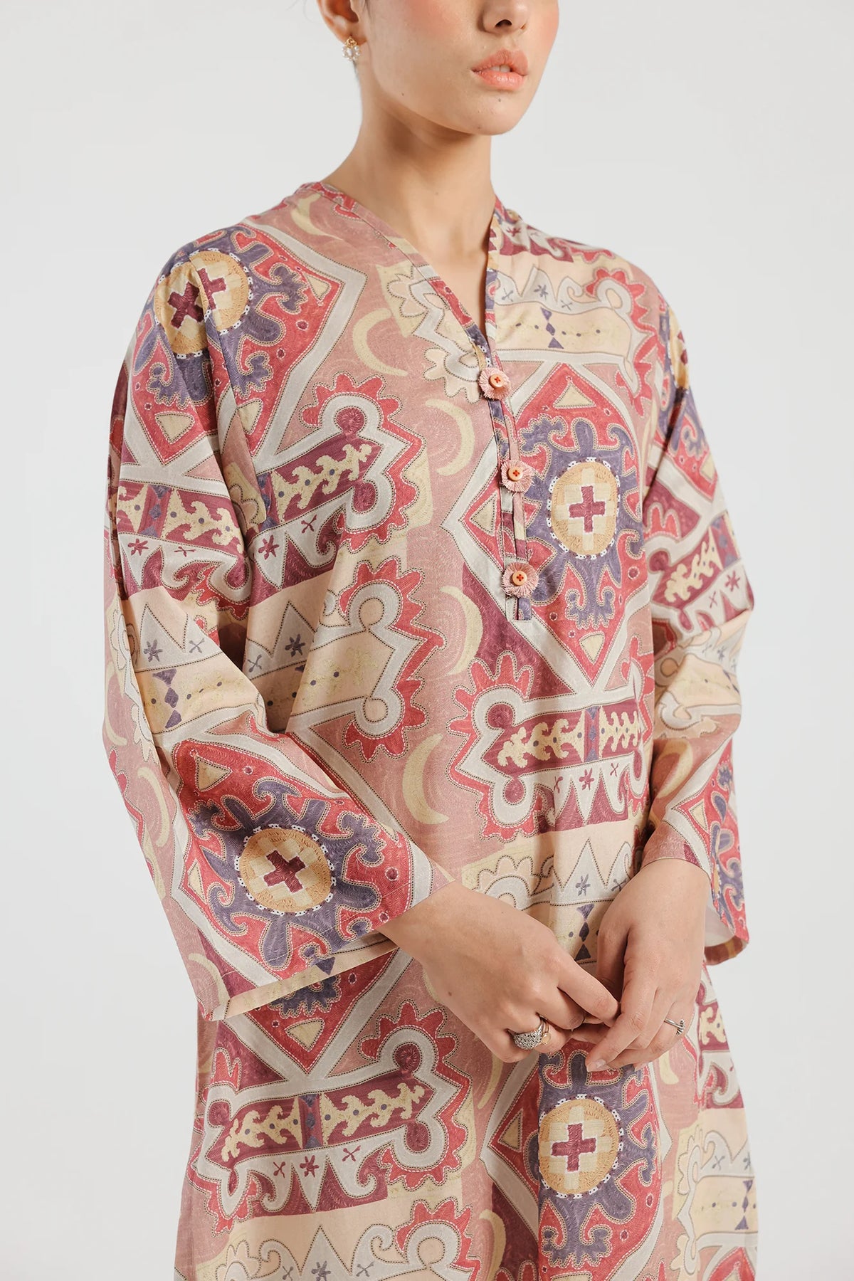 A close-up of Ethnic's lawn fabric, showcasing the fine texture of this Pakistani suit in Canada – breathable and lightweight.