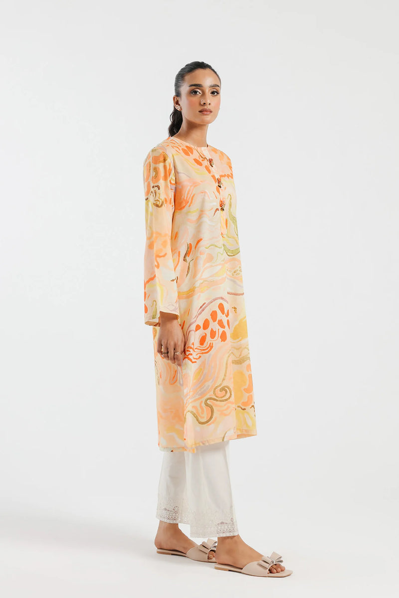 Side profile of Ethnic’s printed lawn shirt, showcasing surreal prints – a must-have for Punjabi suits lovers.