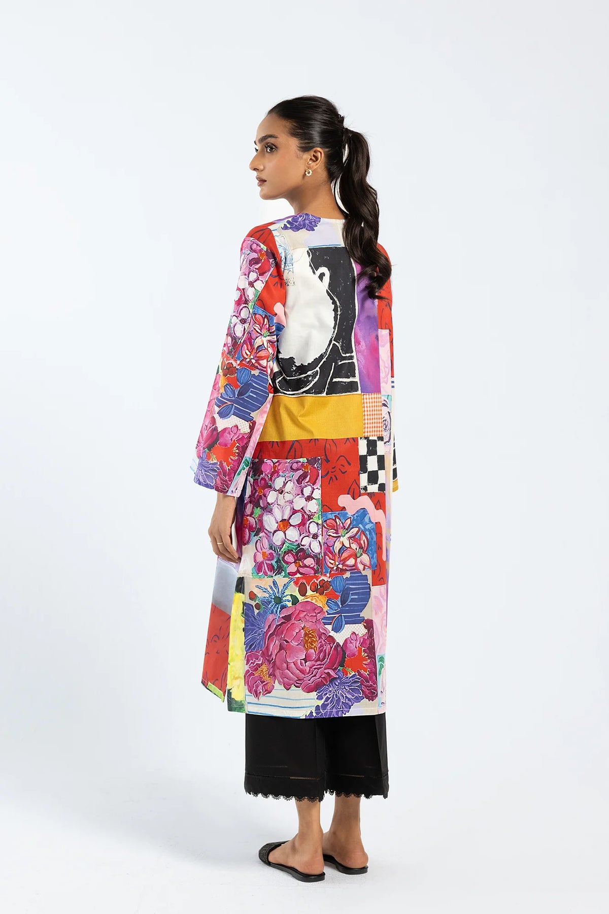  Back view of Ethnic’s poppy red cotton shirt, a trendy choice for Pakistani suits Canada, offering breathable cotton fabric.
