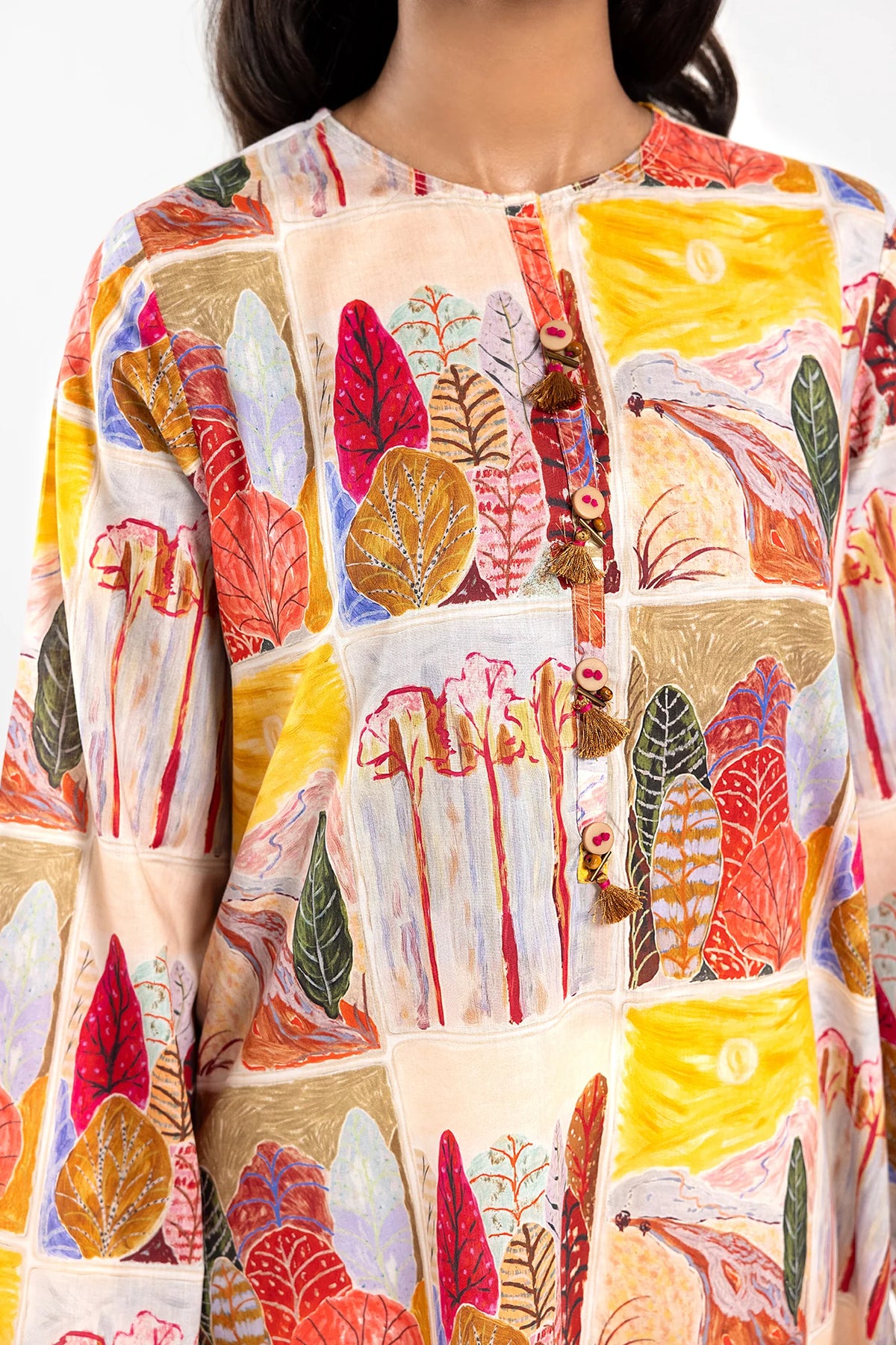 Detailed close-up of Ethnic’s printed lawn fabric, showcasing vibrant patterns – a must-have Pakistani suit for women in Canada.