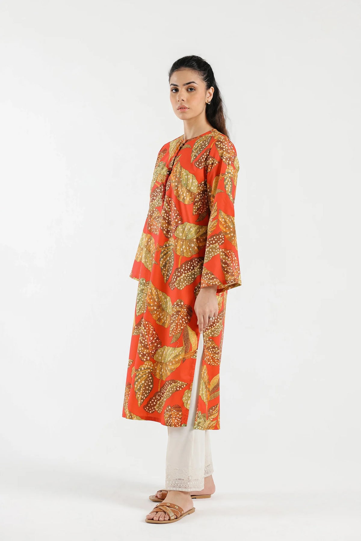 Side view of Ethnic's vibrant printed lawn shirt, a trendy outfit for casual occasions and Pakistani suits lovers in Canada.