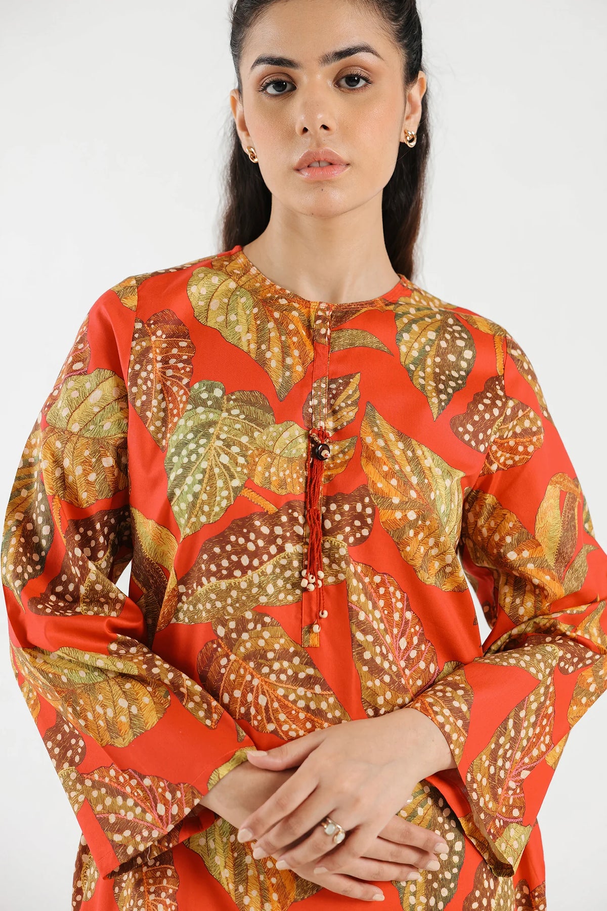 Soft lawn fabric with detailed front embellishments – shop Pakistani suits from Ethnic at Tarz-e-Mashriq today!