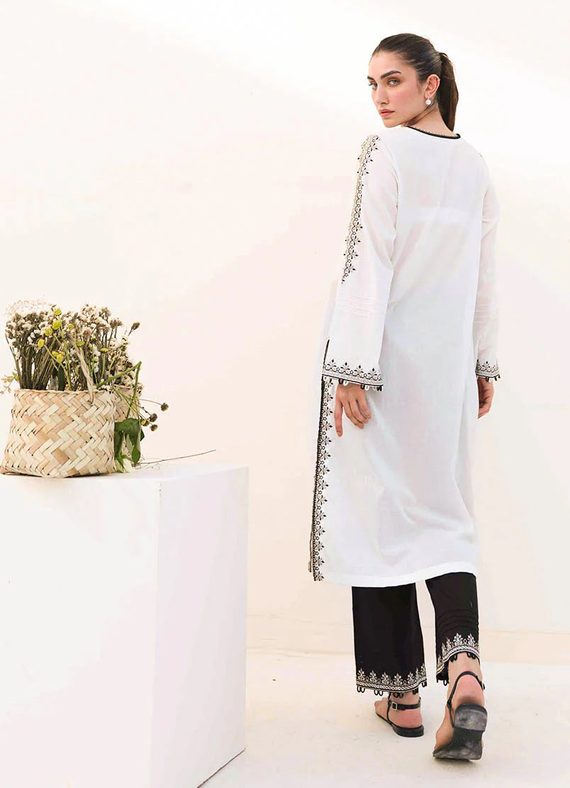 Back View of Pakistani suits for women – Backside of the embroidered in premium cotton fabric for a sophisticated touch.