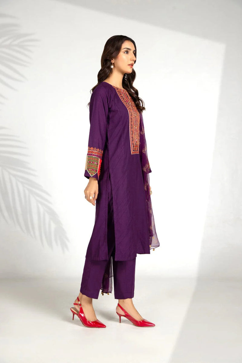 women wearing A medium-size Chinyere lawn karandi suit in American Purple, showcasing its premium craftsmanship – ideal for Punjabi suits lovers.