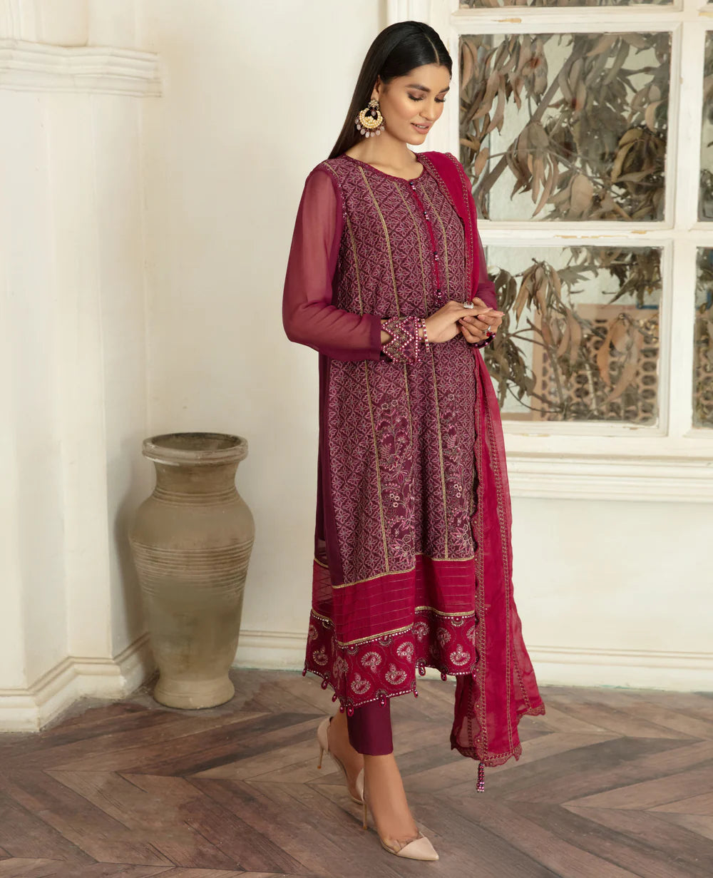 women wearing Elegant Pakistani suit in Canada by Xenia, featuring intricate embroidery on chiffon fabric, perfect for formal wear.