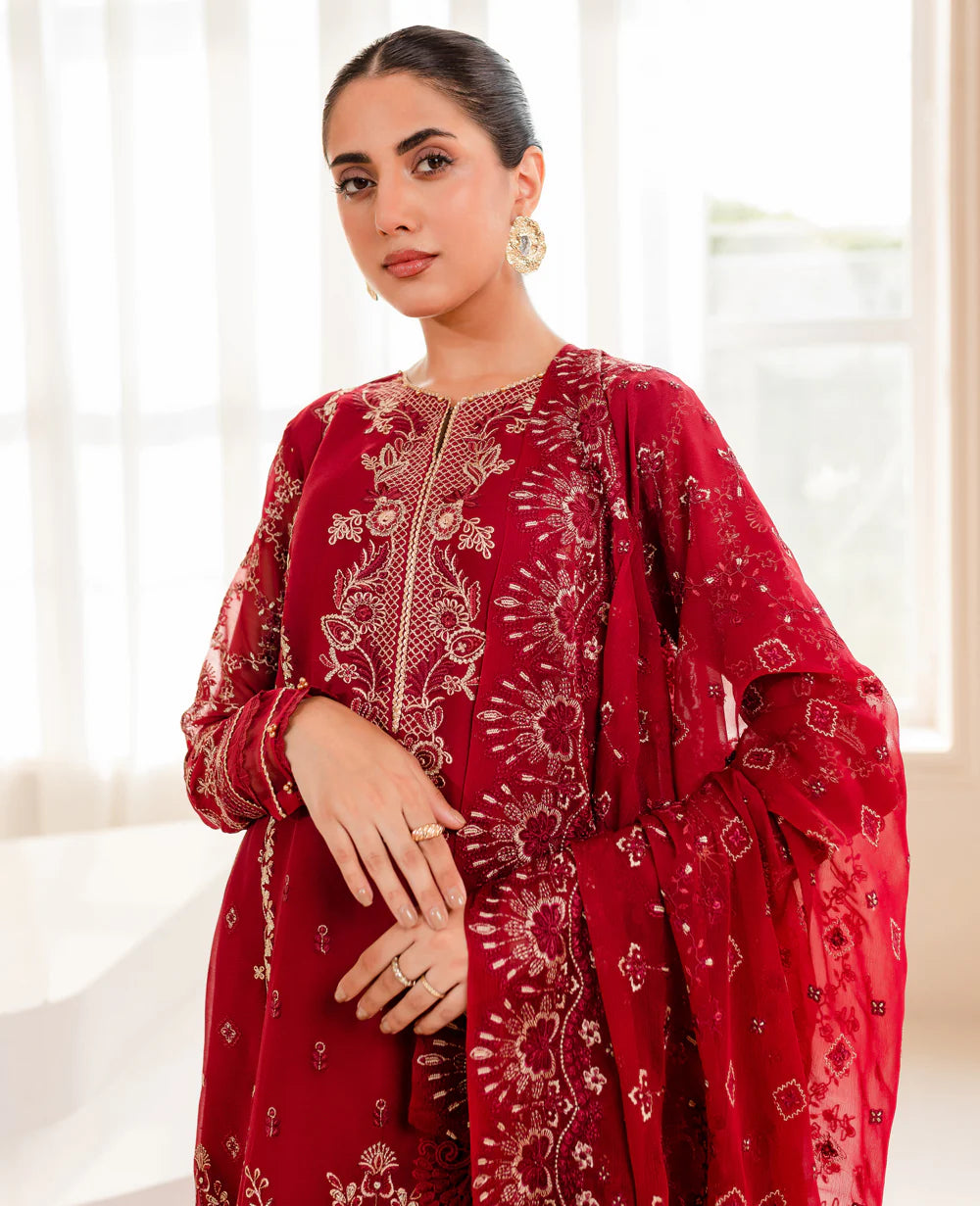 Detailed embroidery of Xenia’s maroon chiffon suit, showcasing premium craftsmanship in Pakistani suits for women in Canada.