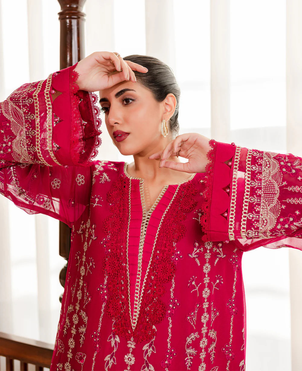 Close-up of intricate embroidery on Xenia’s chiffon suit, highlighting craftsmanship and premium quality for Pakistani suits online Canada.