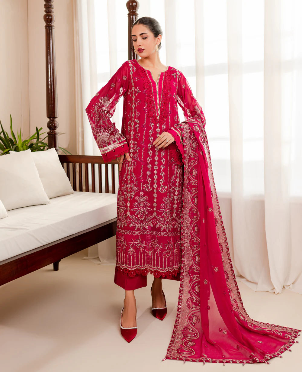 Xenia’s deep shocking pink chiffon suit, featuring luxurious raw silk trousers – an elegant Pakistani suit for women in Canada.