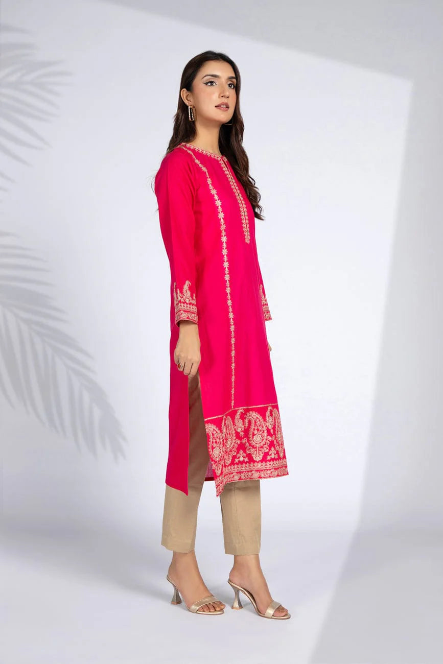 Side profile of Chinyere’s vivid raspberry slub khaddar shirt, offering premium comfort and sophistication in Pakistani suits.