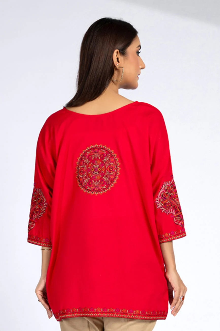 Rear view of Chinyere’s red lawn karandi shirt, a timeless choice for Pakistani suits online in Canada for women.