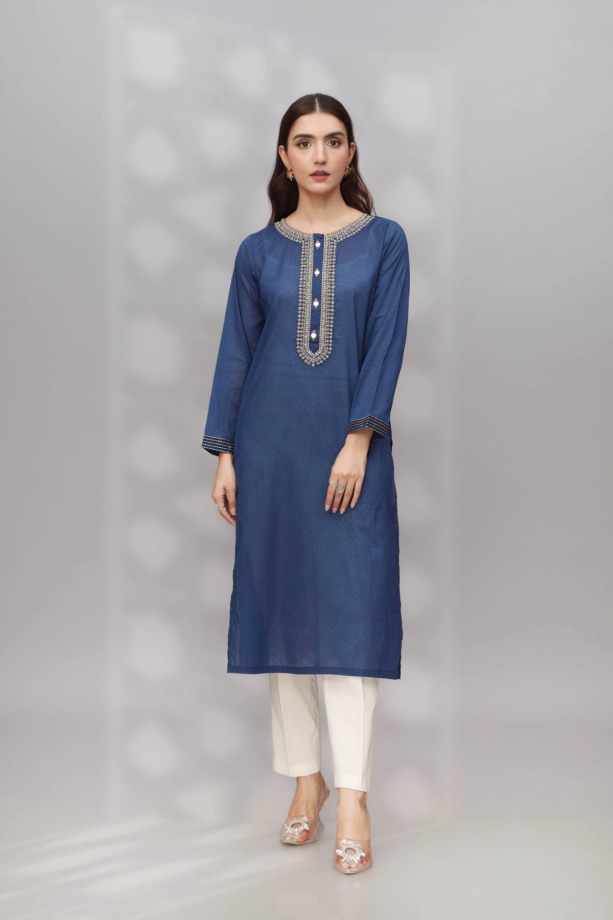 WOMEN WEARING Chinyere blue printed lawn shirt – a stylish Pakistani suit online in Canada, perfect for casual wear.