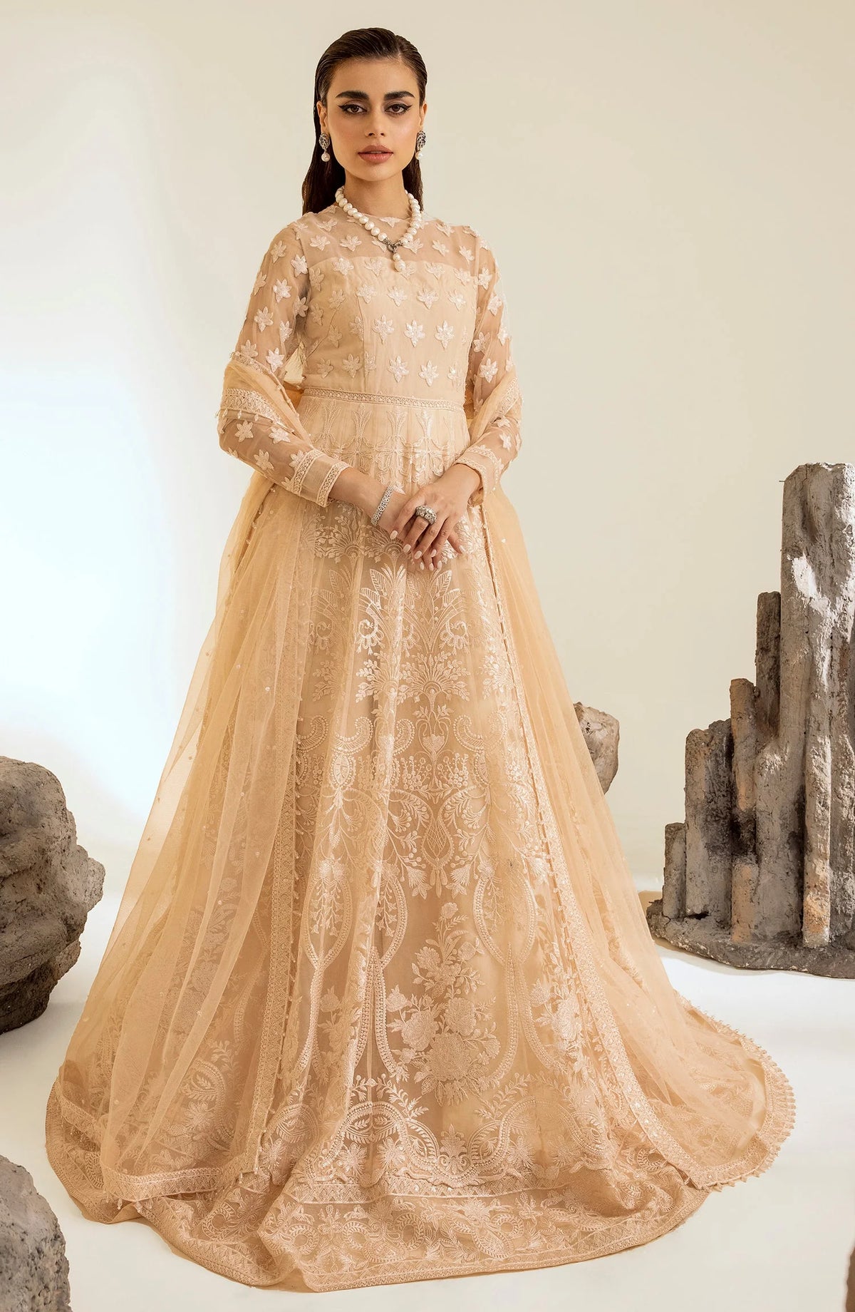 Shop Pakistani suits in Canada with this exquisite peach wedding dress from Maryum & Maria, featuring intricate embroidery on soft organza.