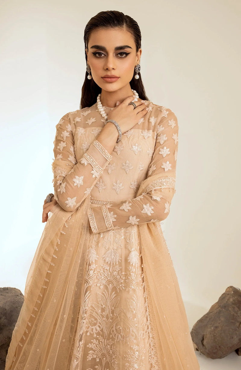 Close-up of Maryum & Maria’s peach embroidered organza maxi dress – a stunning Pakistani suit, perfect for formal and wedding wear.
