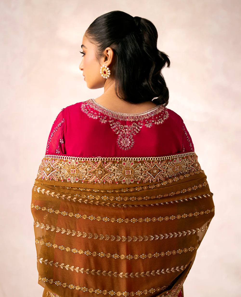 close up of a Rear view of Xenia’s embroidered red chiffon suit, highlighting its exquisite craftsmanship – ideal for those seeking formal Pakistani suits online in Canada.
