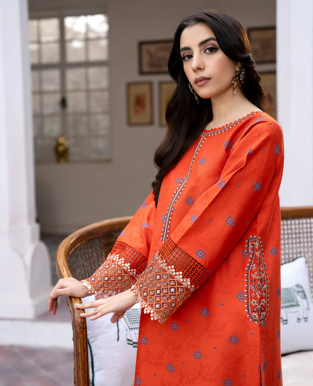 Shop Pakistani suits in Canada with this elegant orange Terre lawn jacquard suit from Xenia, perfect for semi-formal wear.