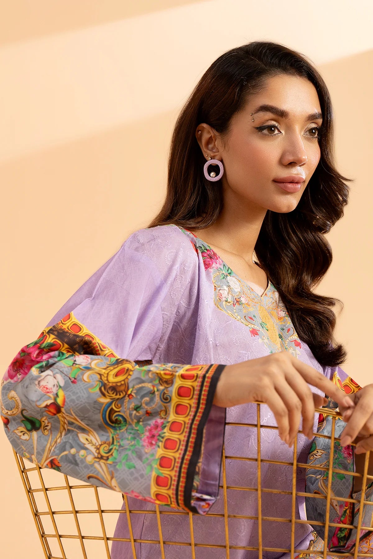 A side profile of Charizma’s elegant purple lawn shirt, a chic addition to Pakistani suits for women in Canada.