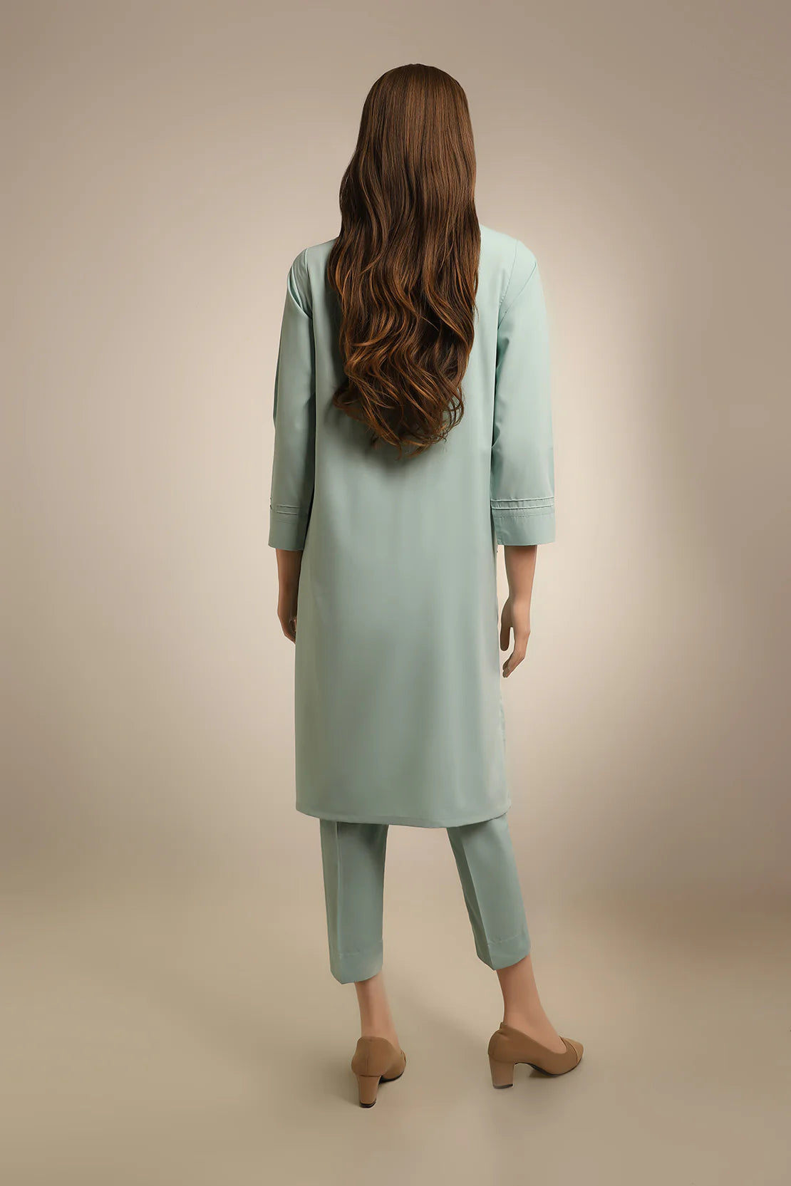 Rear view of Saya’s elegant 2PC formal suit, highlighting a tailored fit and premium fabric for a polished look.