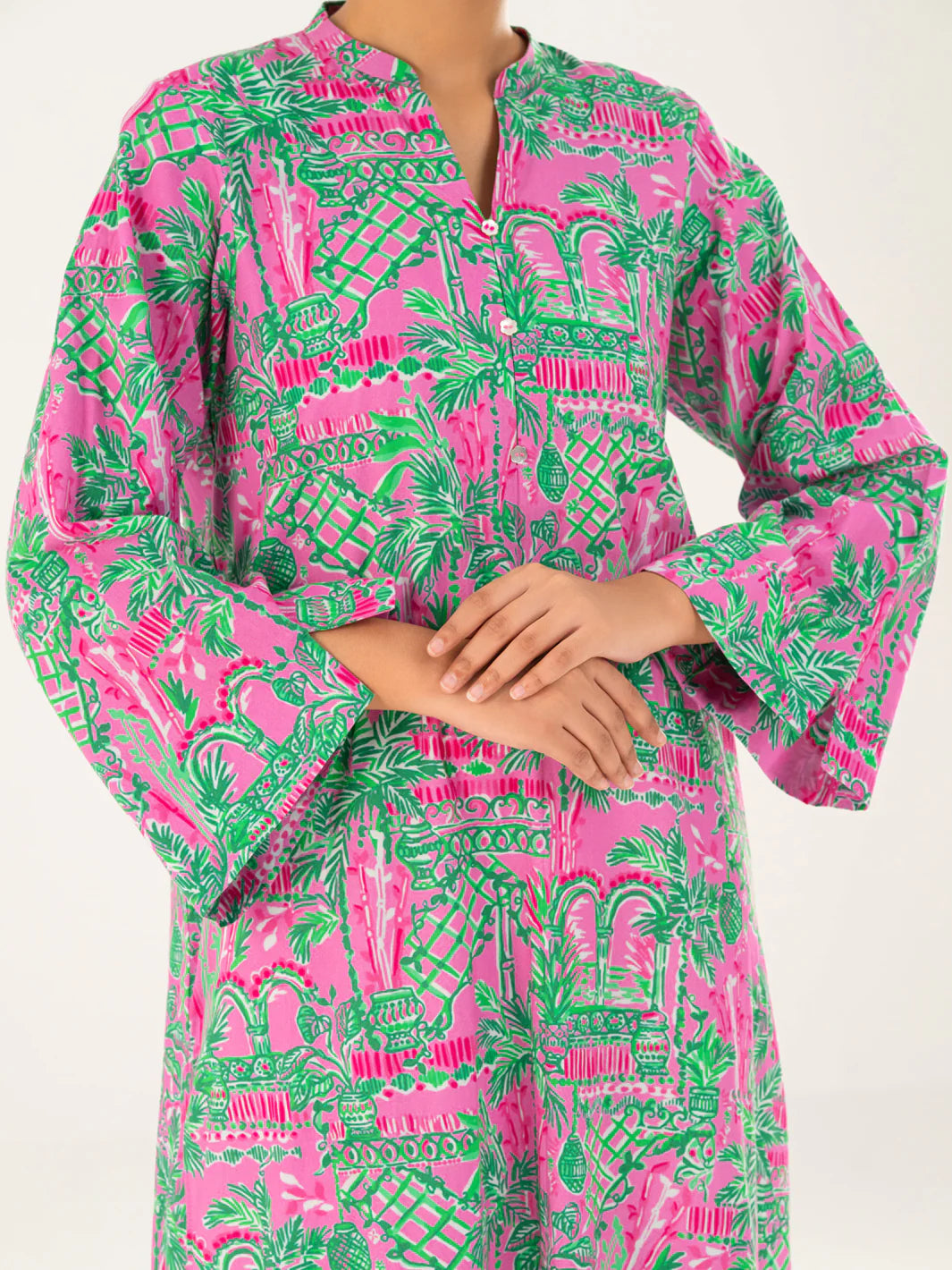 Woman close-up upper body front view mandarin collar button placket pink green cambric kurti Almirah Eid Diwali Pakistani suits Canada