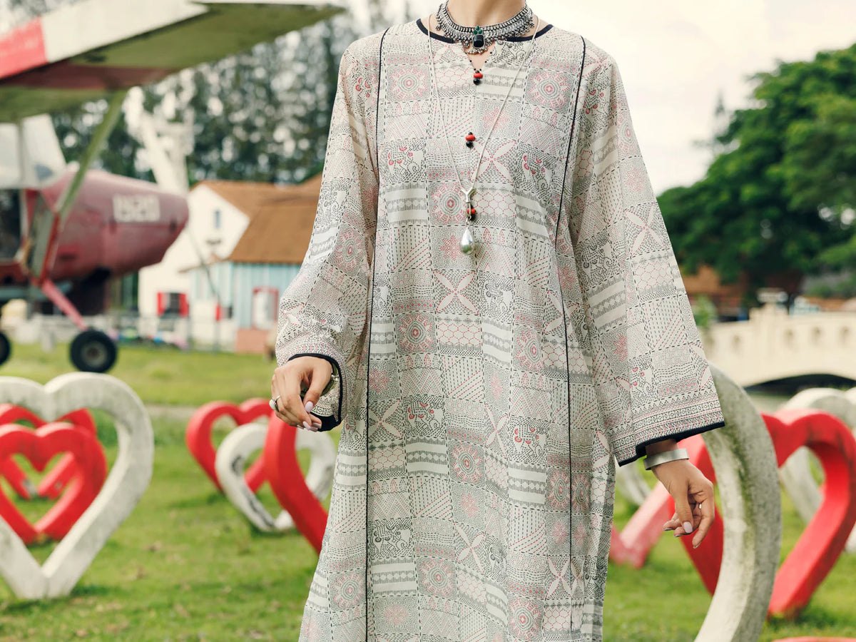 Close-up front view Almirah off white foam printed lawn kurti tassel detail women Pakistani suits online Canada