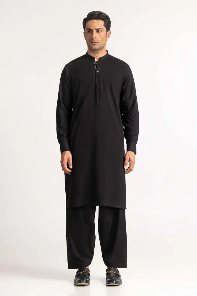 GulAhmed black suit – a sophisticated Pakistani suit online in Canada, tailored with premium blended fabric for a timeless look.