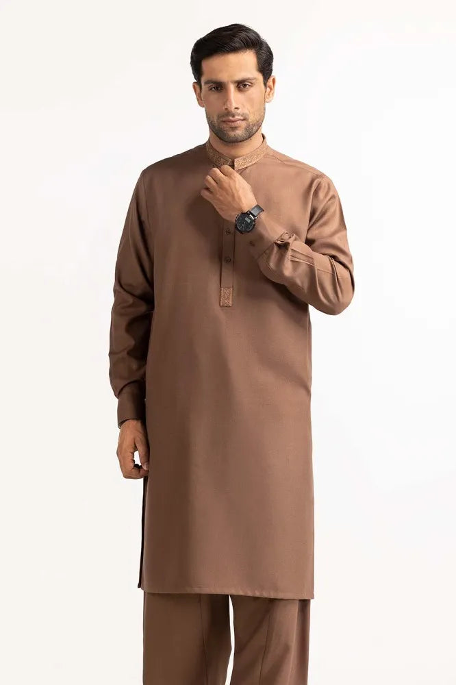Shop Pakistani suits in Canada with this elegant brown embroidered suit from GulAhmed, perfect for semi-formal occasions.