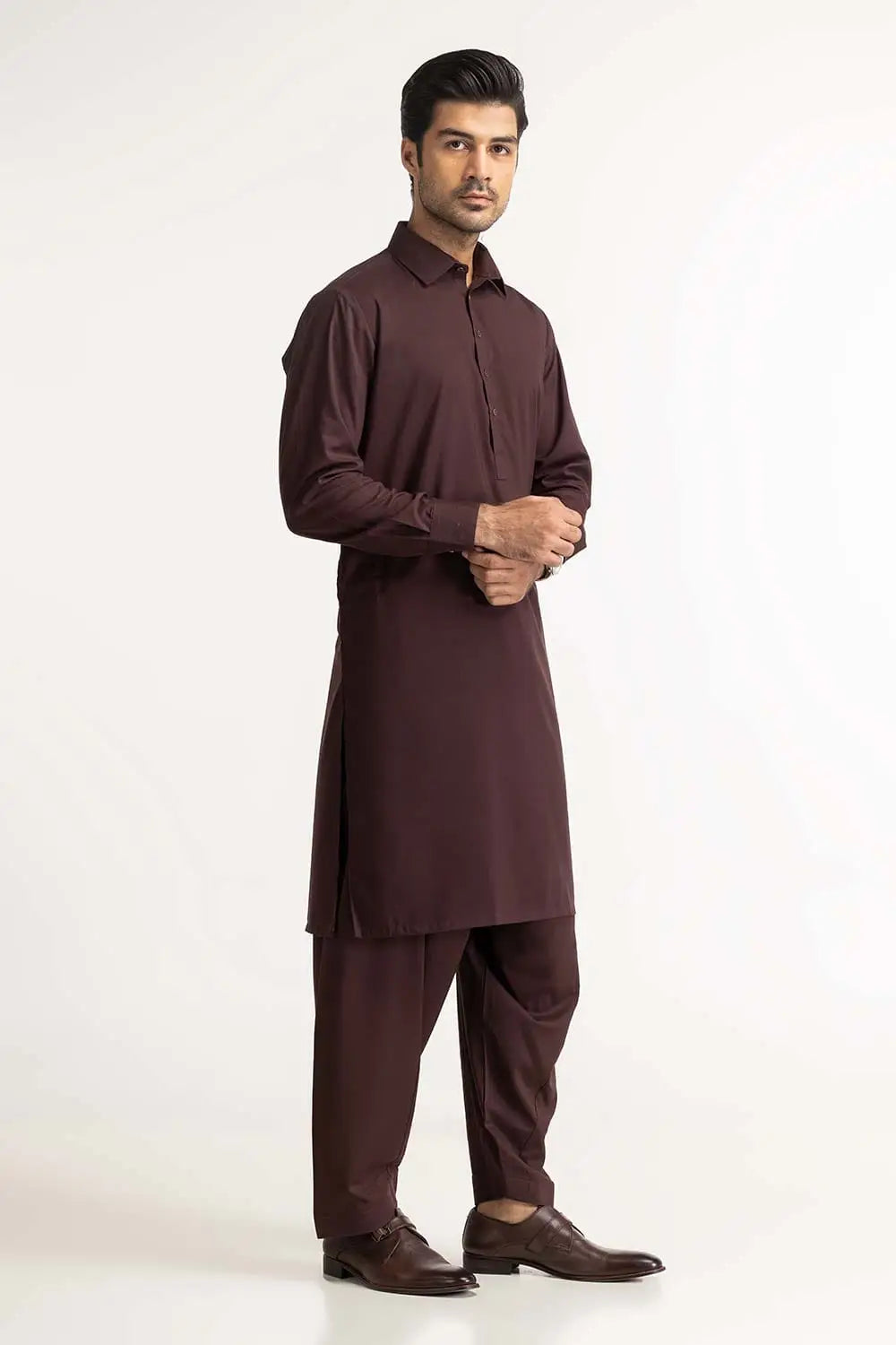 GulAhmed’s premium burgundy suit for men, a sophisticated choice for formal Pakistani suits in Canada.
