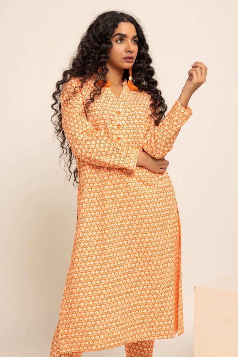  Pakistani suits in Canada – an orange smart-fit cotton kurta from Khaadi, ideal for casual wear.