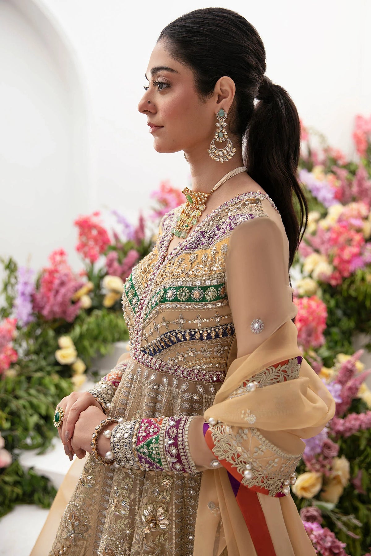 Elegant beige Pakistani bridal outfit Zaha Alysiah with detailed embroidery and traditional craftsmanship for weddings
